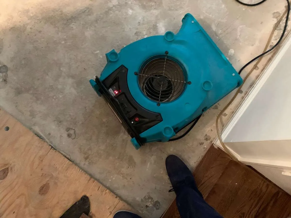Air mover drying subfloor during Leak Detection & Repair in Hidden Valley Lake